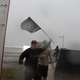 Illustration for article titled True Fans Dont Grab An Umbrella, They Grab A Battle Flag